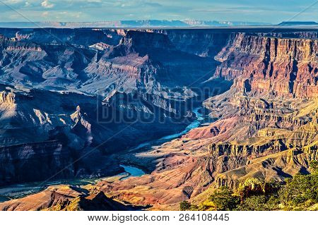 Sunrise At Mather Point, Grand Canyon National Park, Arizona. Photo Shows A Group Of Tourists Watchi