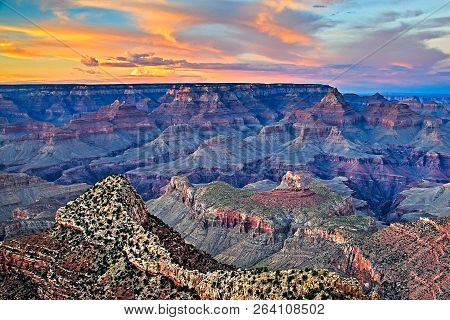 Sunrise At Mather Point, Grand Canyon National Park, Arizona. Photo Shows A Group Of Tourists Watchi