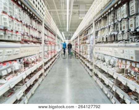Abstract Blurred Store For Home Improvement And Diy. Warehouse Aisle Of Building Materials In Indust
