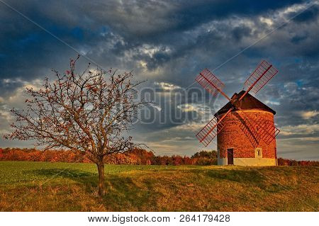 Beautiful Old Windmill. Landscape Photo With Architecture At Sunset (golden Hour). Chvalkovice - Cze