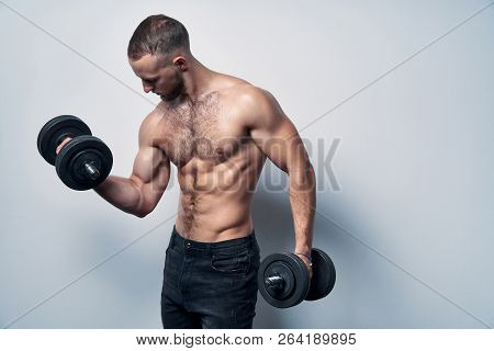 Strong Sport Sirtless Man Making Weightlifting With Dumbbells