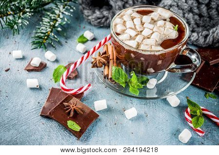 Homemade Hot Chocolate With Mint, Candy Cane And Marshmallow, Light Blue Background With Warm Blanke