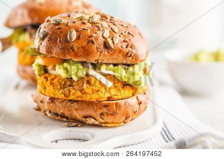 Vegan Sweet Potato (or Pumpkin) Burgers On White Background. Vegetable Burgers, Avocado, Vegetables 