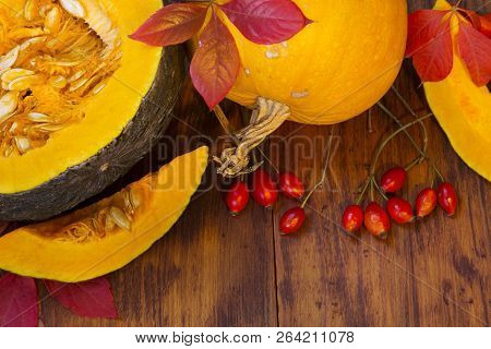 Pumpkins On Wooden Background - Top View
