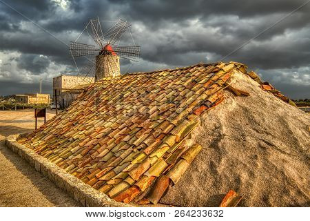 Along The Tidal Flats South Of Trapani, Sicily Are The Salt Ponds. Many Of The Wind Driven Salt Mill