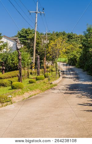 Samcheok, South Korea; September 25, 2018: Phallic Shaped Statues Erected On Grass Lawn That Lines A