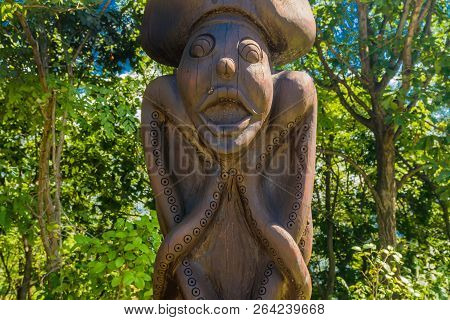 Samcheok, South Korea; September 25, 2018: Closeup Of Wooden Statue Of Person With Octopus Arms And 
