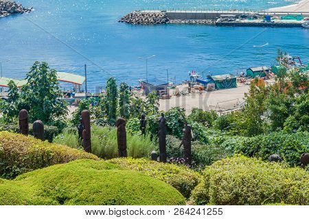 Samcheok, South Korea; September 25, 2018: Penis Shaped Statues In Public Garden Overlooking Ocean W