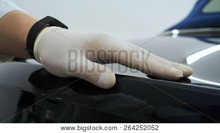 Professional Master After Polishing And Painting Cars, Checks The Flashlight Scratches, A Respirator