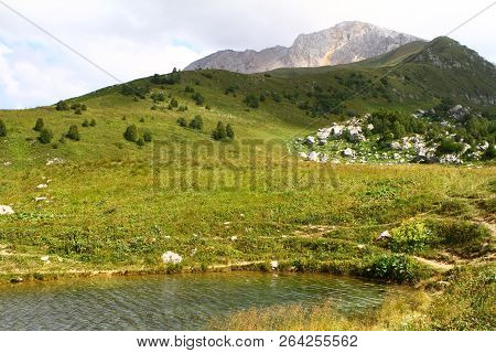 Natural Landscape Photo Of Small Mountain Lake Psenodakh In North Caucasus At Fisht And Oshten Mount