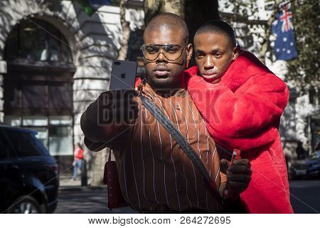 Two Friends Take A Selfie On The Phone