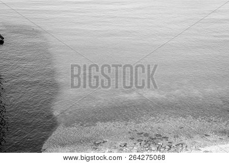 Jebha Island And Waves And Rocks