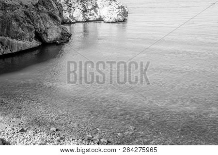 Jebha Island And Waves And Rocks