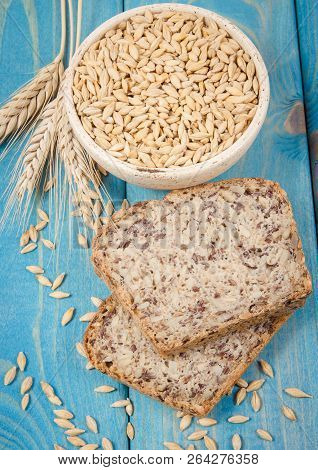 Multi-grain Bread On A Wooden Background. Healthy Food Concept.