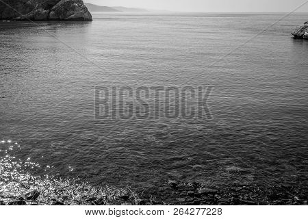 Jebha Island And Waves And Rocks