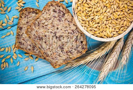 Multi-grain Bread On A Wooden Background. Healthy Food Concept.