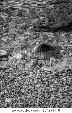 Playa Monica Island And Waves And Rocks
