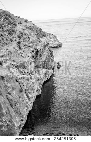 Jebha Island And Waves And Rocks