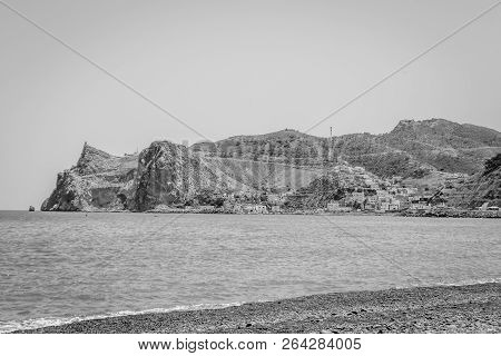 Jebha Island And Waves And Rocks
