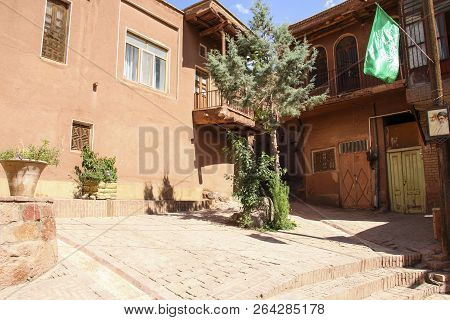 Mountain Village Abyaneh With Characteristic Red Houses In Central Part Of Iran. Unesco World Herita