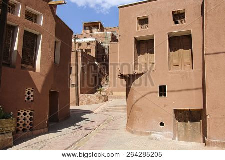 Mountain Village Abyaneh With Characteristic Red Houses In Central Part Of Iran. Unesco World Herita
