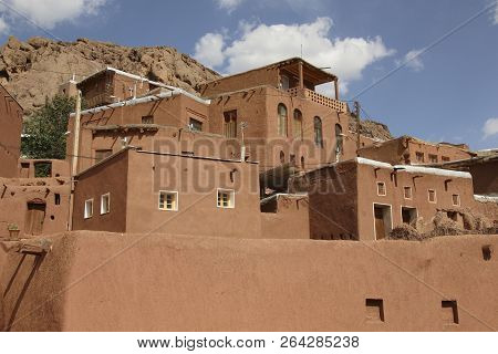 Mountain Village Abyaneh With Characteristic Red Houses In Central Part Of Iran. Unesco World Herita