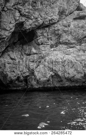Jebha Island And Waves And Rocks