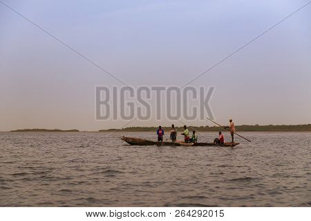 Orango Island, Guinea-bissau - February 3, 2018:  Fishermen Collecting The Nets In An Old Traditiona
