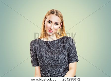 Portrait Of Modern Confident Blond Woman Wearing Elegant Ornamental Blouse Smiling At Camera