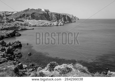 Houcima Beach And Waves And Rocks