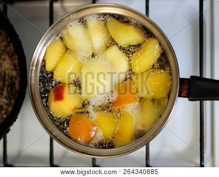 Apple Compote Is Cooked In A Saucepan. Homemade Compote Of Fresh Apples. Healthy Food. The View From