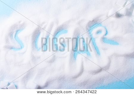 Sugar Word In Sugar On Blue Background