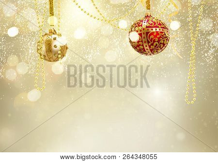 Golden Christmas Balls Garland On Glowing Golden Background With Copy Space