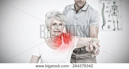 Highlighted pain against physical therapist massaging patient hand