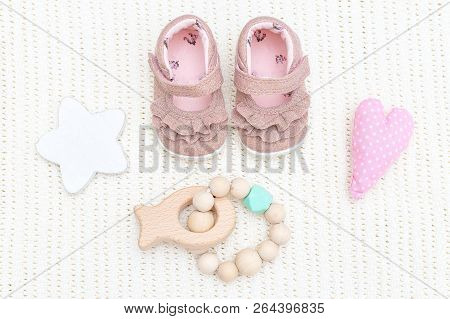 Baby Pink Shoes And Wooden Teether. Baby Accessories