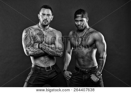 Tattoo Is Symbolic. Sexy Men With Muscular Torso. Muscular Men With Fashionable Tattoo Style. Brutal