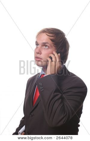 Empresário no telefone sobre um fundo branco