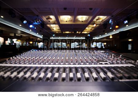 Dj Professional Control Panel On A Blurred Background Festive Hall.
