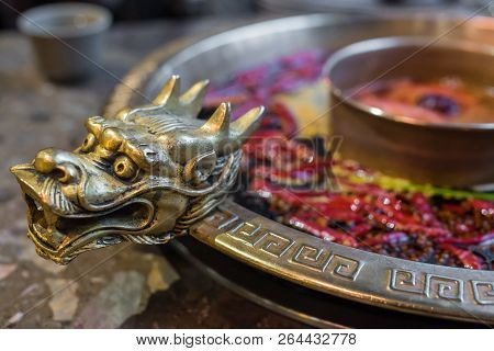 Chengdu Sichuan Hot Pot Close Up With Dragon Head Sculpted Handles, Chenggdu, Sichuan Province, Chin