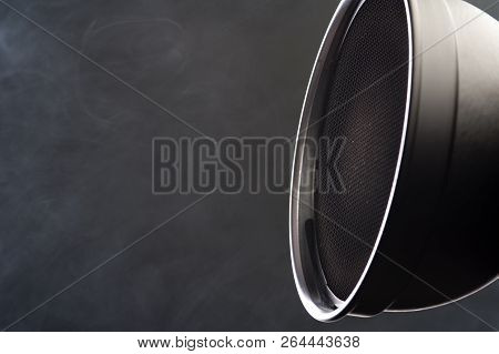 Close-up - Round Plafond Of Professional Black Studio Illuminator On The Grey Background. Photo Stud