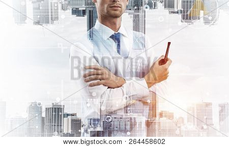 Confident And Young Businessman In Smart-casual Wear Smoking Pipe And Modern Cityscape With Business