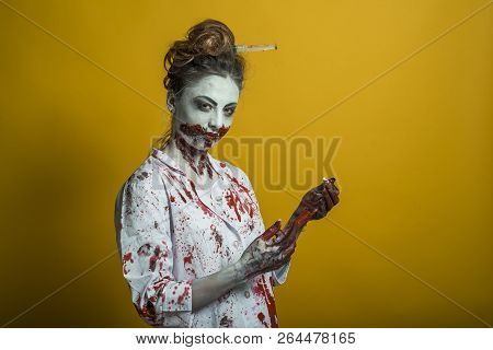 Scary Damaged Girl In Nurce Halloween Costume Looking Like Zombie On Yellow Background