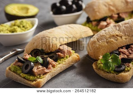Bruschetta With Tuna, Olives And Avocade Spread.