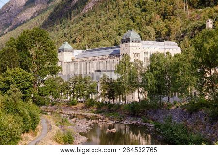 RJUKAN, NORWAY - JULY 14, 2018: Saheim Hydroelectric Power Station operated by Norsk Hydro. The station building (1915) was designed by architects Thorvald Astrup and Olaf Nordhagen