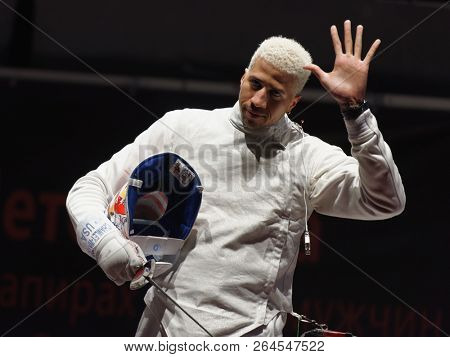 ST. PETERSBURG, RUSSIA - MAY 6, 2018: Miles Chamley-Watson, USA in the team final match against Italy during Fencing World Cup Saint-Petersburg Foil. This annual tournament is hold in 44th time