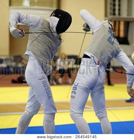 ST. PETERSBURG, RUSSIA - MAY 6, 2018: Team competition Russia vs USA during Fencing World Cup Saint-Petersburg Foil. This annual tournament is hold in 44th time