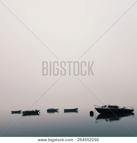 Mistical Weather, Boats On The Lake In The Fog