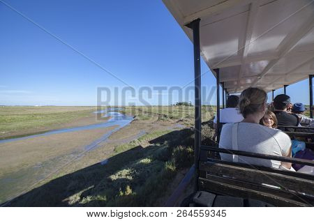 Tavira, Portugal - October 14th, 2018:  Mini-train At Barril Beach That Transports Visitors From The