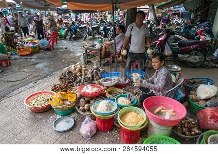 Ho Chi Minh City, Vietnam - August 25, 2017: Cho Xom Chieu Fresh Produce Market Sellers And Their St