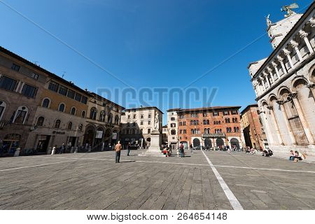 Lucca, Italy - April 16, 2017: Piazza San Michele (town Square) With The Church (san Michele In Foro